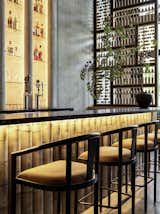 Backlit bar area with over-scale Chinese abacus styled partition