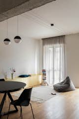 Living Room, Light Hardwood Floor, Sofa, Bench, and Pendant Lighting  Photo 4 of 13 in LOR35 by sunostudio