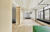Living Room, Ceiling Lighting, and Light Hardwood Floor  Photo 6 of 12 in Garment District Apartment by Group Projects Architecture