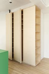 Kitchen, Colorful Cabinet, and Wood Cabinet  Photo 7 of 12 in Garment District Apartment by Group Projects Architecture