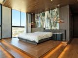 Master bedroom podium and faux onyx backwall.