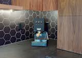 Ceramic Tile Backsplashe, Ceiling Lighting, Drop In Sink, and Medium Hardwood Floor Attention all baristas, this Airbnb comes with a Gaggia espresso machine in thunder black  Photo 5 of 23 in Hipster Basecamp by Christin Khan