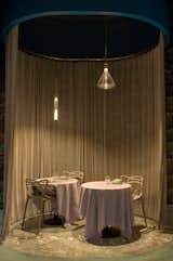Open privet room for six people.
- Floor: Verde Antigua marble slab by ABC Stone
- Aluminum curtains
- Soffit: water metal ripple, Geneva model by G-Tex (UK)
- Lights: N55 by Viabizzuno
- Chairs: Masters by Kartell