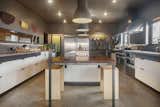Fully-equipped professional kitchen featuring a 16-foot island