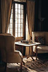 Living Room, Table, and Chair  Photo 3 of 8 in Greystone Mountain Estate by Fantastic Frank