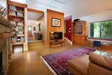 One of the homeowners is a skilled woodworker and inside the home, had crafted beautiful wood built-ins which host a collection of books and curated art. 