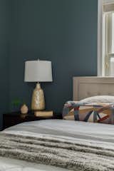 Custom pillows and high contrast for this guest bedroom.