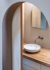 Bath Room, Medium Hardwood Floor, Vessel Sink, Wall Lighting, and Wood Counter Designed by Tan Yamanocuhi & AWGL  Photo 19 of 20 in A Cat Tree House by Tan Yamanouchi & AWGL