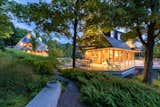 Exterior, Wood Siding Material, Gable RoofLine, Metal Roof Material, Glass Siding Material, House Building Type, Shed RoofLine, and Stone Siding Material Main House  Photo 4 of 21 in Sugarview by David MacLean