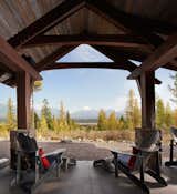 Outdoor, Boulders, Shrubs, Gardens, Back Yard, Trees, Wood Patio, Porch, Deck, Stone Patio, Porch, Deck, Concrete Patio, Porch, Deck, Large Patio, Porch, Deck, Grass, and Hardscapes Back Porch  Photo 4 of 27 in Glacier's Edge by Timberbuilt