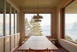 Dining Room, Table, Pendant Lighting, Chair, and Terra-cotta Tile Floor Dining room  Photo 10 of 27 in Le Grand Bercail by L. McComber Architecture Vivante