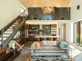 Kitchen, Concrete Floor, Cooktops, Refrigerator, Microwave, Wall Lighting, Wall Oven, Undermount Sink, Ceramic Tile Backsplashe, Wood Cabinet, Engineered Quartz Counter, and Ceiling Lighting  Photo 3 of 6 in Sunset Bench Passive House by Meghan Hanson