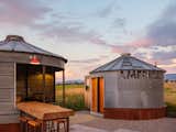 Two grain silos from the property were move to near the home and turned into an outdoor kitchen with pizza oven and a bath house