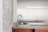 Kitchen, Drop In Sink, Wood Counter, Metal Cabinet, and Pendant Lighting raw materials  Photo 10 of 17 in Hotel des Monnaies by Beatrice Colaiacomo