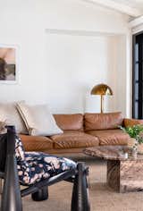 Living Room, Sofa, Terra-cotta Tile Floor, Ceiling Lighting, Lamps, Floor Lighting, Coffee Tables, Rug Floor, and Chair  Photo 7 of 11 in Gables House by Prime Projects