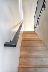Plywood stairs and industrial-style railings