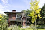 Exterior, Brick Siding Material, House Building Type, and Flat RoofLine East elevation  Photo 9 of 14 in Villa Trompenberg by Desley Hakkert