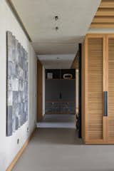 Doors, Wood, Folding Door Type, and Interior Hall  Photo 6 of 12 in Bosques Apartment by Taller David Dana