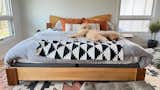 Bedroom, Rug Floor, Light Hardwood Floor, and Bed  Photo 15 of 21 in Midcentury House by Tyler Parker