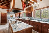 Character-Filled Galley Kitchen With Views to the Formal Garden Below