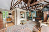 Bedroom, Night Stands, Chair, Bed, Table Lighting, Dresser, and Medium Hardwood Floor Primary Suite with Soaring Ceilings  Photo 8 of 13 in French Normandy Revival Estate In Coveted Enclave of Beverly Hills Lists for $8.5M by Beyond Shelter
