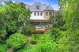 Exterior, Tile Roof Material, Stucco Siding Material, and House Building Type Edward Huntsman-Trout Landscape Design  Photo 11 of 13 in French Normandy Revival Estate In Coveted Enclave of Beverly Hills Lists for $8.5M by Beyond Shelter