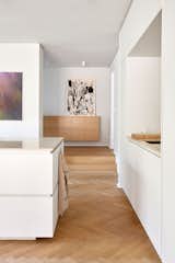 Hallway and Light Hardwood Floor New to the entrance from the kitchen island   Photo 8 of 12 in C59 by HAA&D