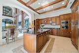 Fabulous kitchen with custom cabinetry, flooring and ceiling