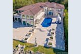 Exterior and House Building Type Imagine entertaining in this spacious outdoor area of this luxurious home!  Photo 15 of 19 in European Style Mansion Near Oldest Operational Lighthouse in Florida by TC McClenning