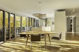 The transition into the home is marked by shifting textures and light.