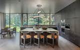 Natural light pours through carefully placed apertures, casting shifting patterns.