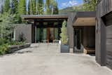 The north wing hosts guest rooms and a garage, offering privacy.
