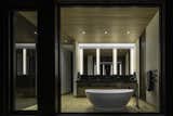 The Primary suite is oriented directly to the pool courtyard and flatirons while the primary bathroom opens to its own northern courtyard and yoga platform.