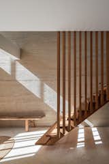 Terra Casa - Entry foyer featuring Hempcrete wall and hardwood timber stairs