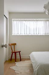 Bedroom, Ceiling Lighting, Chair, Medium Hardwood Floor, and Bed  Photo 12 of 17 in Osborne Laneway Suite by Lanescape Architecture Inc.