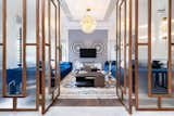 The accent wall in this majlis provides a fitting backdrop to the plush couches and coffee table.