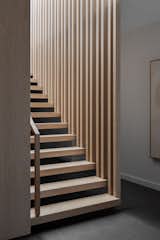 Staircase, Wood Tread, and Wood Railing A  ‘floating’ timber staircase ascends to the kitchen, living and master bedroom.  Photo 3 of 9 in CECIL HOUSE by Chamberlain Architects