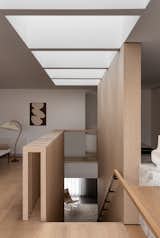Directly above the stairwell is a series of skylights – a practical design feature to compensate for the lack of windows on the east and west boundary walls. 