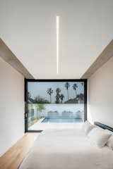 Bedroom, Ceiling Lighting, Light Hardwood Floor, and Bed  Photo 7 of 30 in La Croix by Bomax Architects