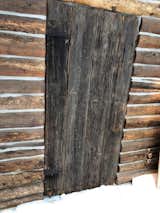 Original front door was plywood and  I salvaged and skinned with a salvaged farm shed door