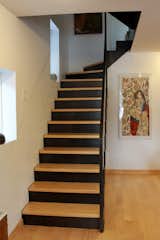 Staircase, Glass Railing, and Wood Tread At the main floor.  Photo 1 of 8 in Steel and Glass Stair by Leo Mieles