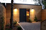 View of Garage from Garden at Dusk