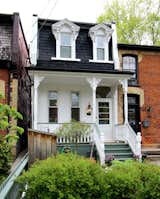 View from street of the historic facade.  A transom window was added above the front door (replacing an opaque panel) to restore what is understood to have been there originally.