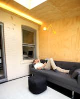 An adjustable light fixture provides task lighting.