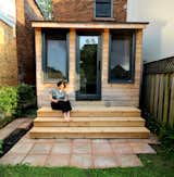 Extended steps provide seating facing the garden. 