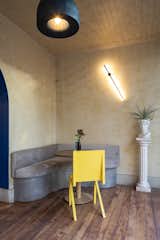 Dining Room, Chair, Table, Ceiling Lighting, Medium Hardwood Floor, Lamps, and Wall Lighting  Photo 8 of 13 in Verde Sazón Restaurant by Estudio Well