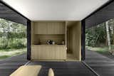 Each Cȃpsula residence features pine cladding for the hallways, cabinetry, and furniture.