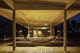 Beams and pillars made from glulam complement wooden paneled walls constructed from cross-laminated timber.