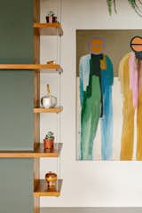 Compact apartment with open-plan spaces and strategic use of custom-made carpentry.