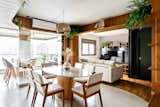 Compact apartment with open-plan spaces and strategic use of custom-made carpentry.